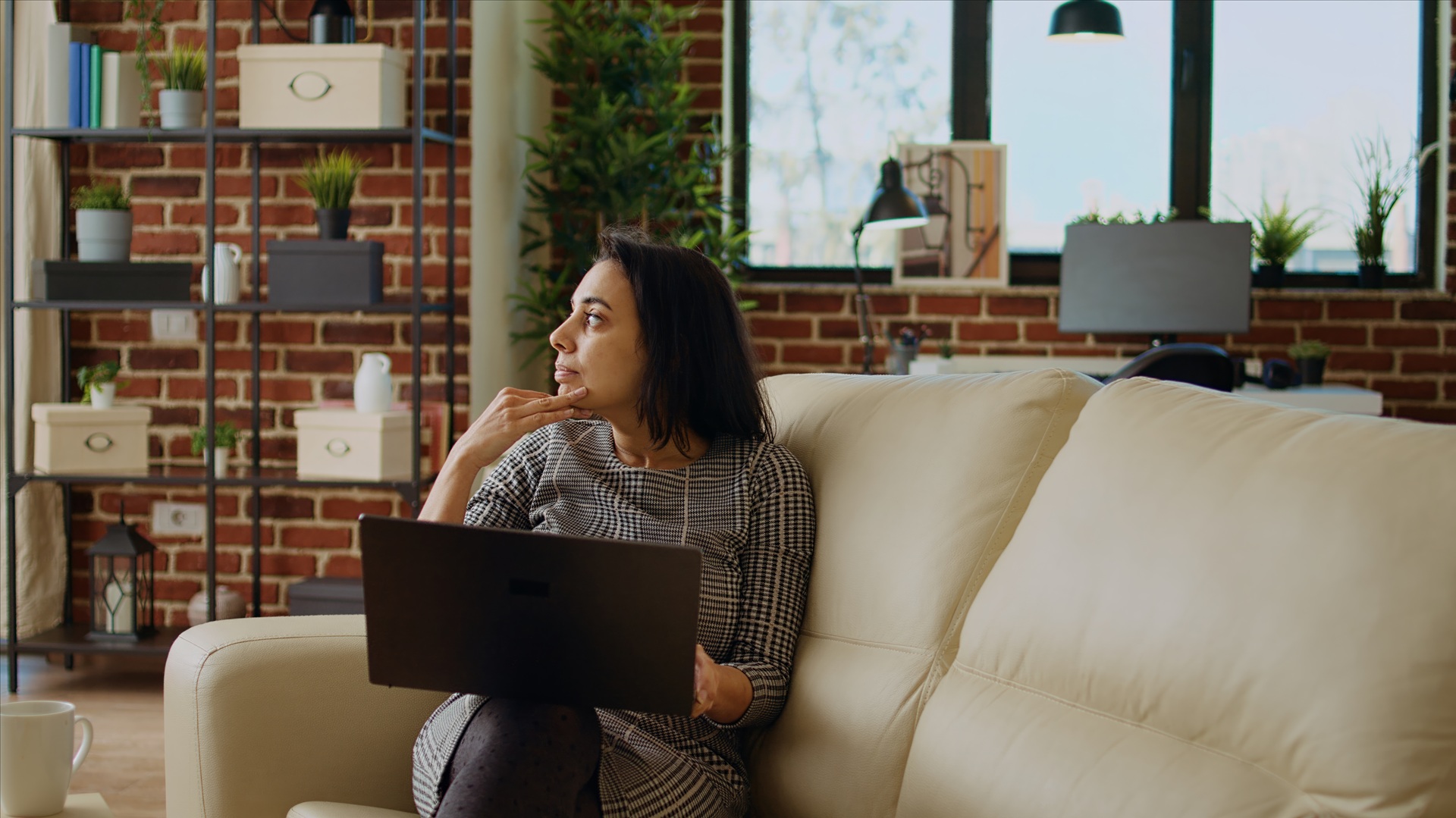 Stressed remote worker looking for creative ideas for project, struggling to figure out problem solutions. Freelancer teleworker overthinking, trying to solve tasks in apartment office, camera A